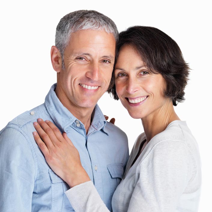 Dental professional conducting an oral cancer screening on a patient.