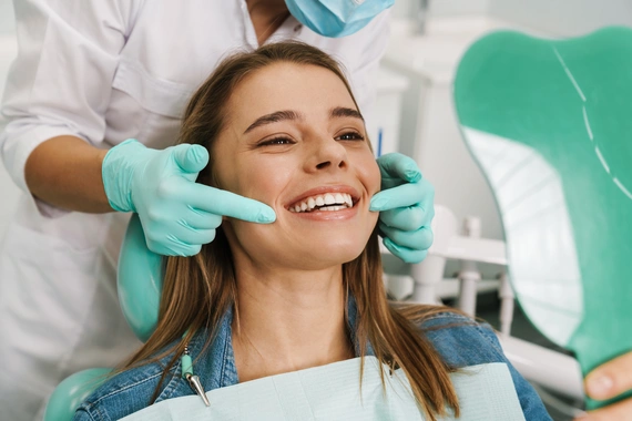 Beautifully improved smile showcasing natural-looking veneers on teeth.